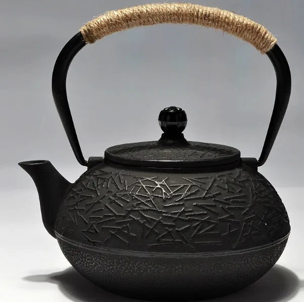 Japanese-style cast iron teapot in a choice of ten patterns, shown in 0.9L size.