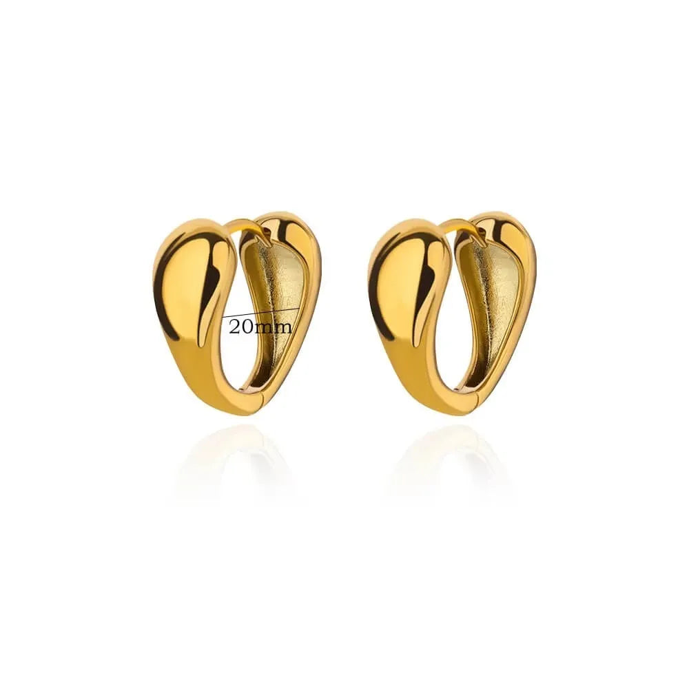 Geometric butterfly earrings for women in copper alloy with heart, bow, and star shapes.