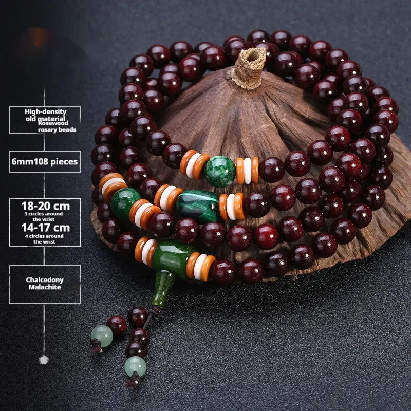 Men's rosewood 108 bead mala bracelet with a turquoise gemstone decorative centrepiece.