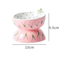 Ceramic raised cat bowl with tilted angle and fruit pattern