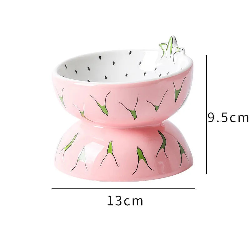 Ceramic raised cat bowl with tilted angle and fruit pattern