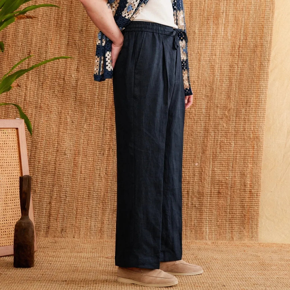 Women's linen high waist trousers with elasticated waistband and straight leg cut in navy blue