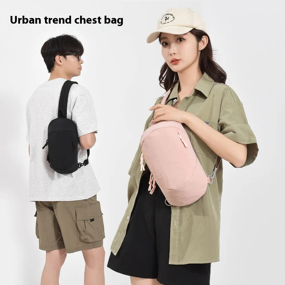 Outdoor crossbody bag in nylon fabric with mobile phone compartment, shown in army green colour