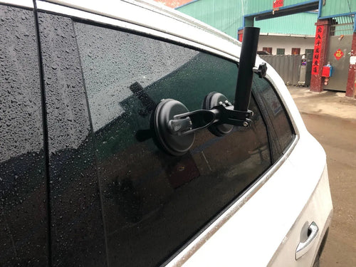 Black ABS and rubber off-road car sucker mount with round glass suction cup.