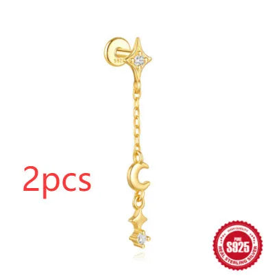 S925 sterling silver geometric star earrings with embedded moon and diamond detail in a gold colour.