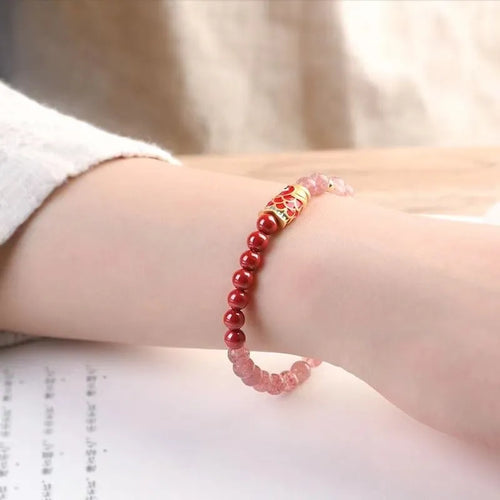 Purple cinnabar and strawberry quartz beaded bracelet with lucky beads and peach blossom motifs