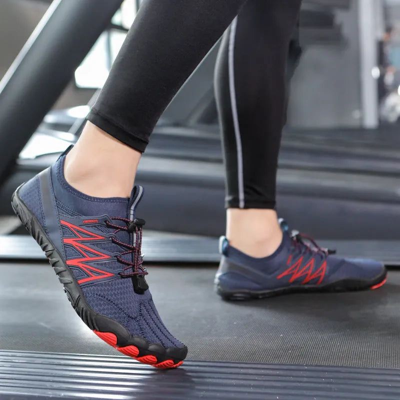 Lightweight striped training sneakers with a mesh upper and non-slip rubber sole in multiple colour options.
