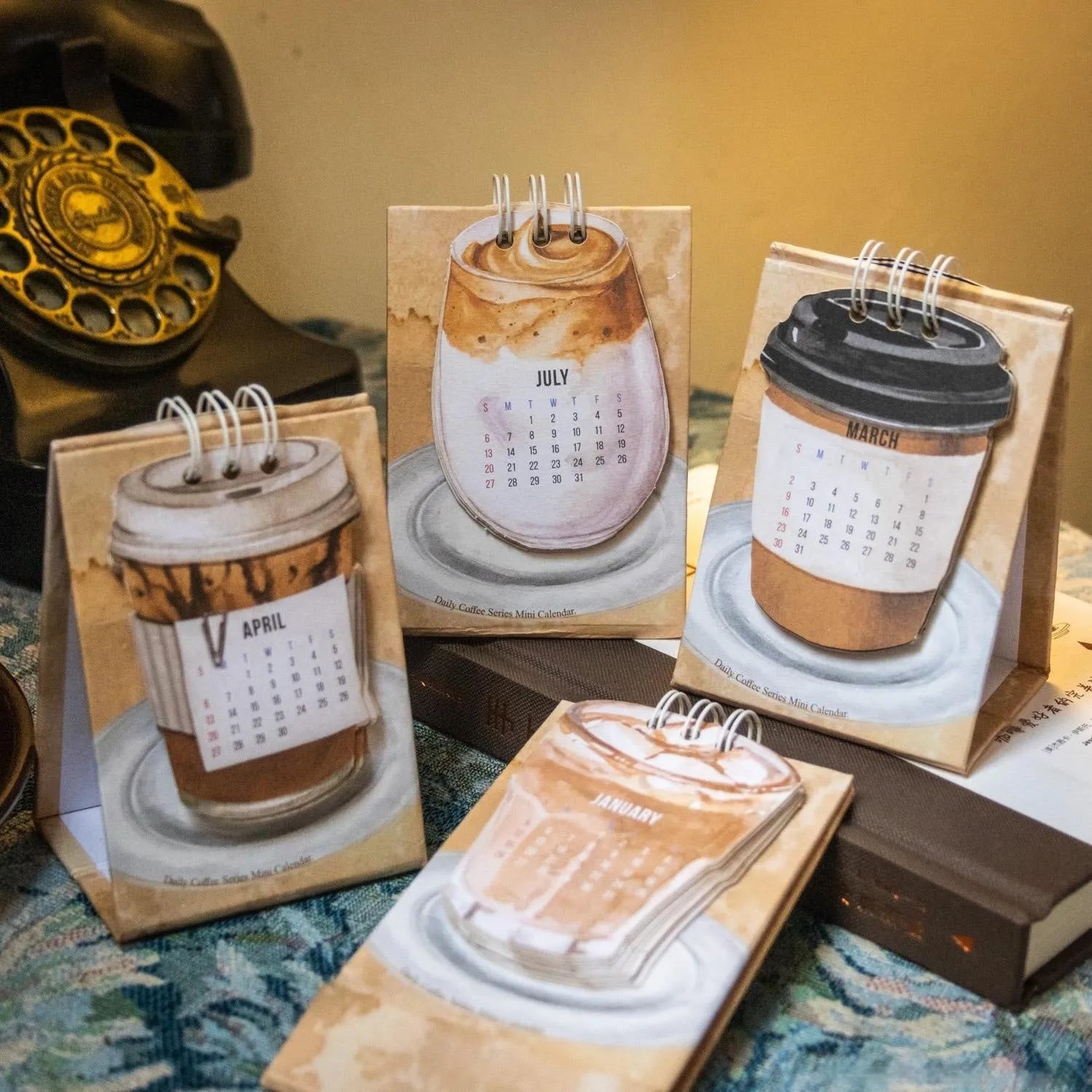 Mini coffee-themed desk calendar for 2025 showing daily pages and simple modern design