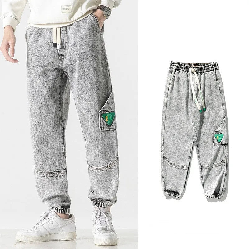 Men's cotton loose-fit tapered trousers in black, blue, or grey colours with mid-waist design