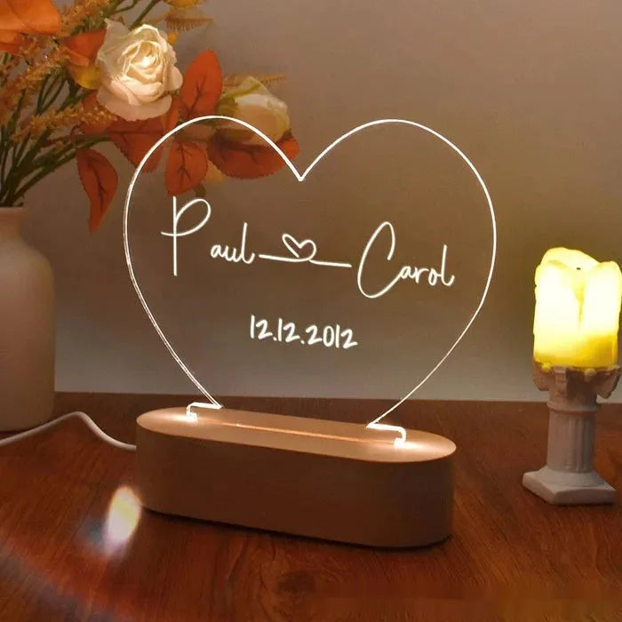 Custom transparent acrylic night light with LED base showing personalised engraving, dimensions 20cm by 11.5cm.