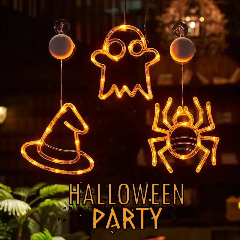 Set of seven Halloween-themed LED hanging lights with suction cups for window display