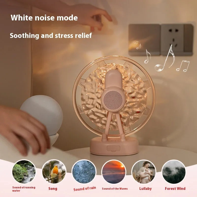 White and pink Ferris Wheel shaped Bluetooth speaker with colourful water ripple LED atmosphere lighting.