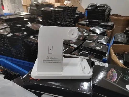 Folding 4-in-1 wireless charging station showing iPhone on vertical stand, Apple Pencil on magnetic spot, and two colour options.