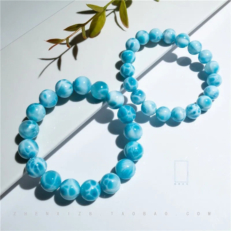 Blue natural crystal sea-pattern stone and Bodhi seed bracelet with pearl accents in Maillard style.