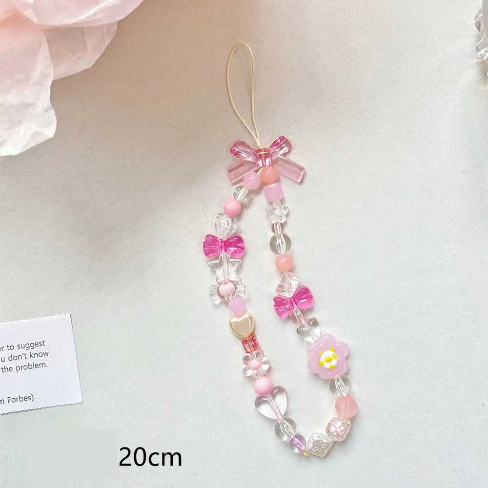 Colourful beaded flower mobile phone lanyard with adjustable hand rope in yellow, blue or pink