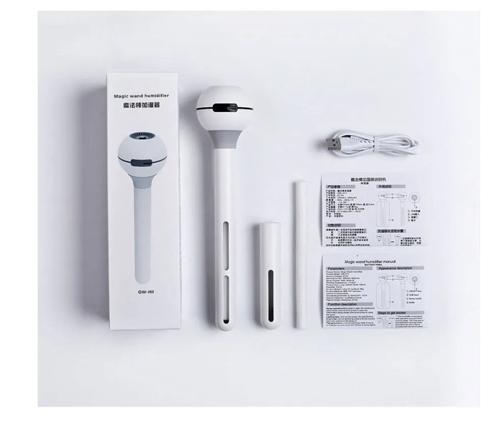 White columnar Magic Wand ultrasonic humidifier with USB cable and mist output.
