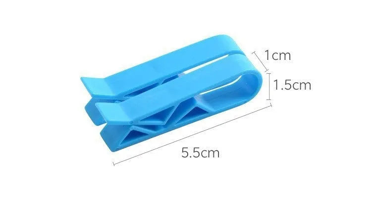 A white PP plastic clip designed to secure a bin bag to the side of a kitchen rubbish bin.