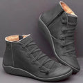 Women's flat casual booties with wedge heel and round toe in multiple colour options.