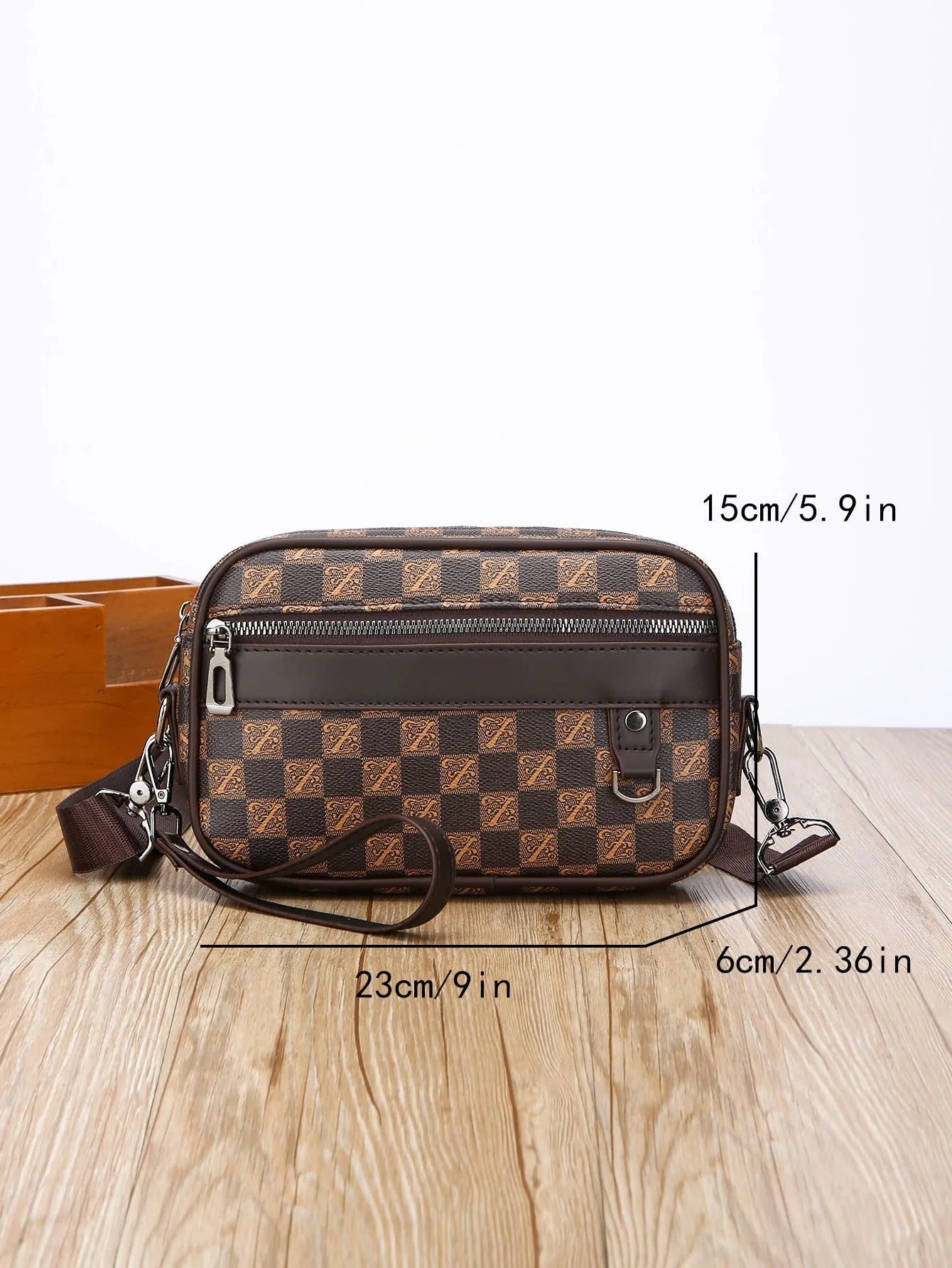 Men's geometric pattern PU messenger bag shown in a horizontal carry position.