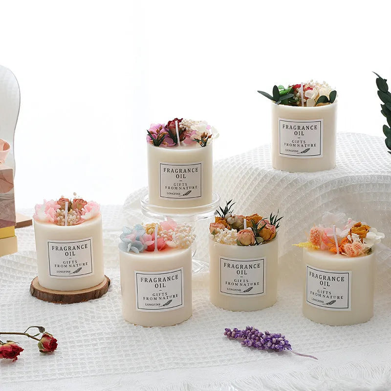 Decorative aromatherapy candle with dried flowers embedded in solid wax, shown with optional wooden chip base.