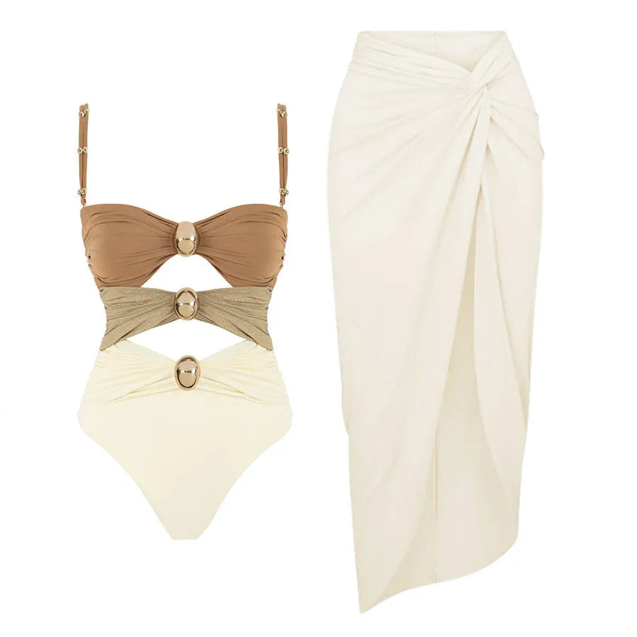 Women's solid colour one-piece swimsuit with a detachable skirt in assorted colours.