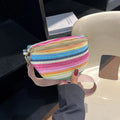 Women's woven straw beach bag with shell shape and single shoulder strap in pink colour