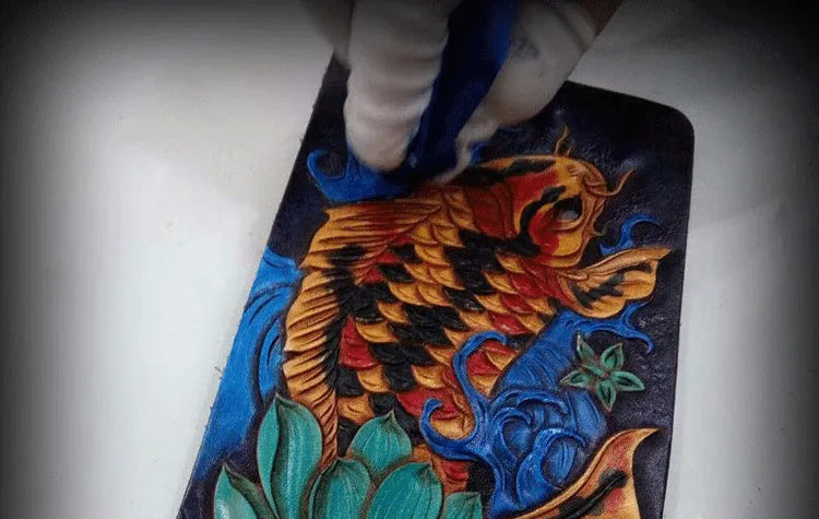Men's hand-carved cow leather short wallet in red, blue, or gold colour, showing open closure design.