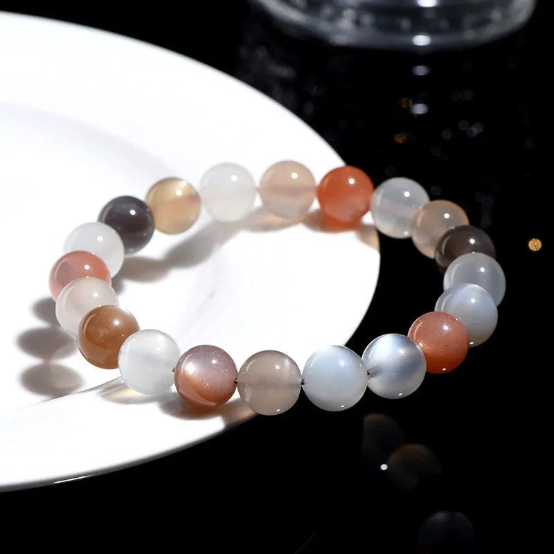 Natural moonstone bracelet with 8mm beads in colourful moon light colour variation