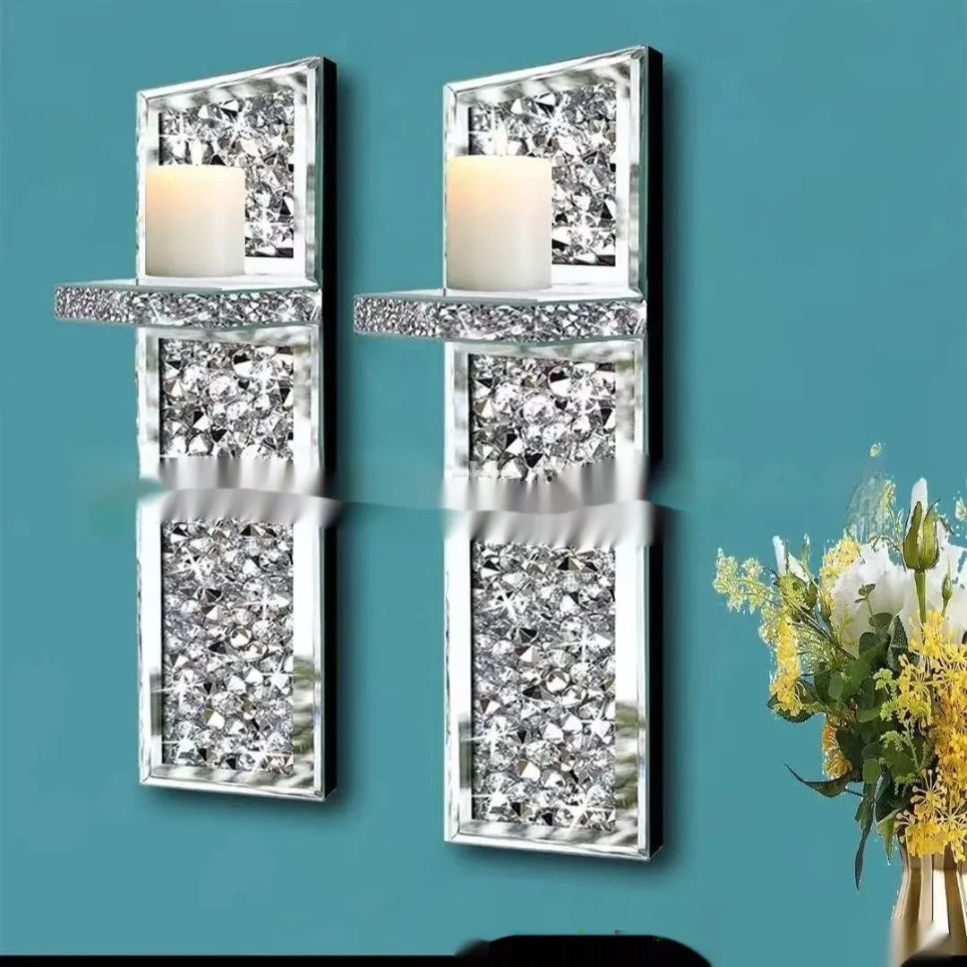 Pair of silver mirror glass wall hanging candle holders measuring 10x11x38 cm
