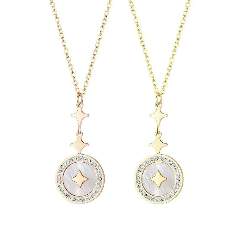 Gold six-pointed star titanium steel necklace on a model, showing the geometric pendant and O-ring chain.