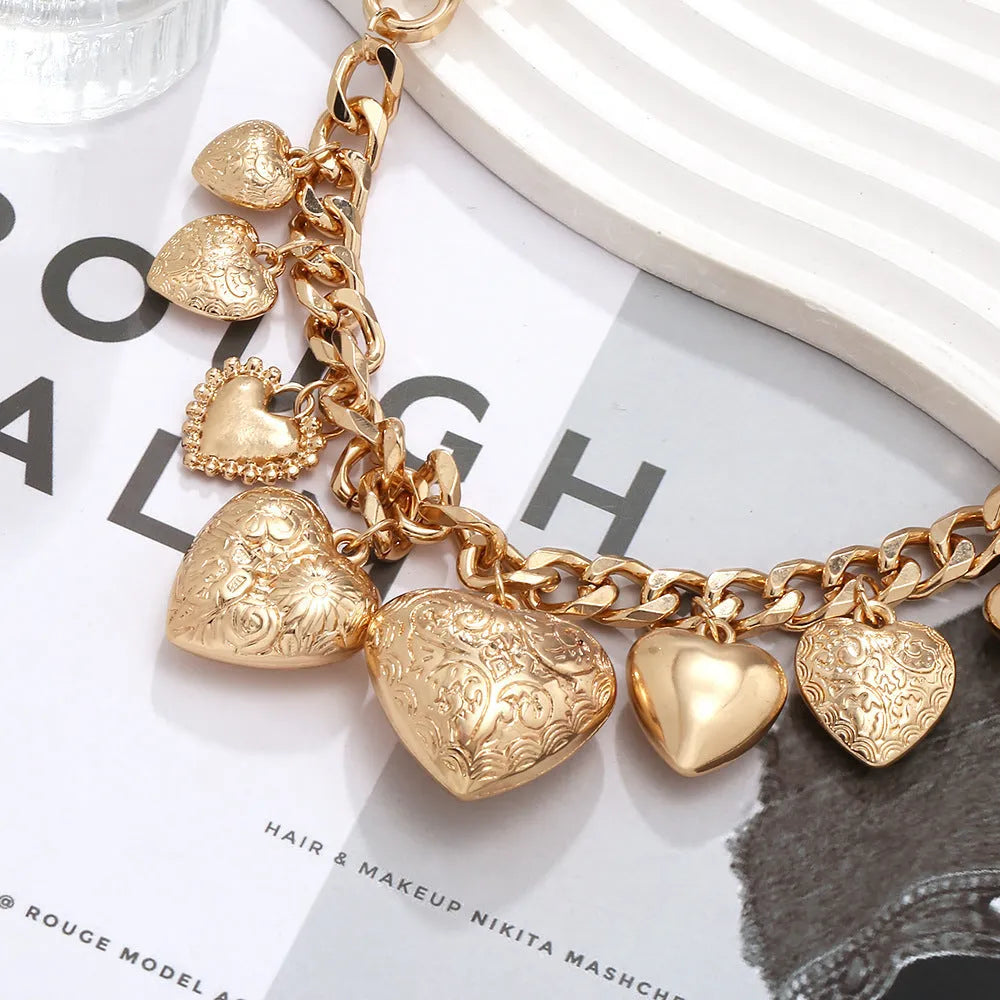 Women's carved heart pendant necklace with adjustable 41-50cm chain in gold colour