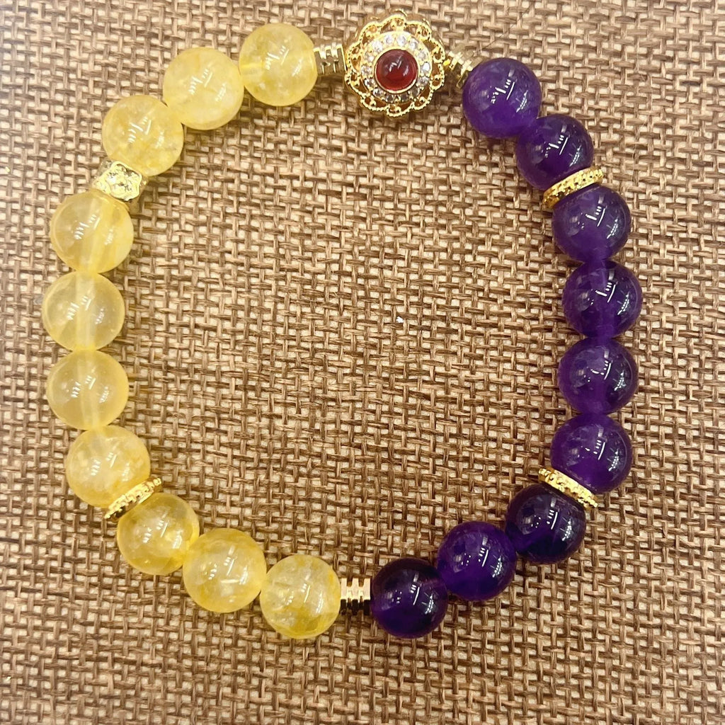 Handmade women's amethyst crystal bracelet with yellow and purple stones