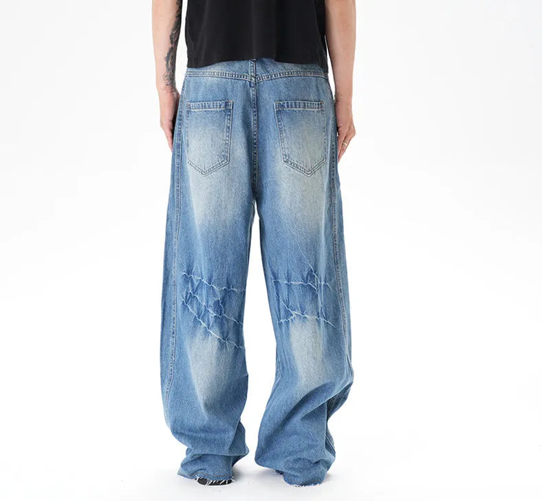 Light blue vintage washed wide leg jeans with zipper closure on mannequin