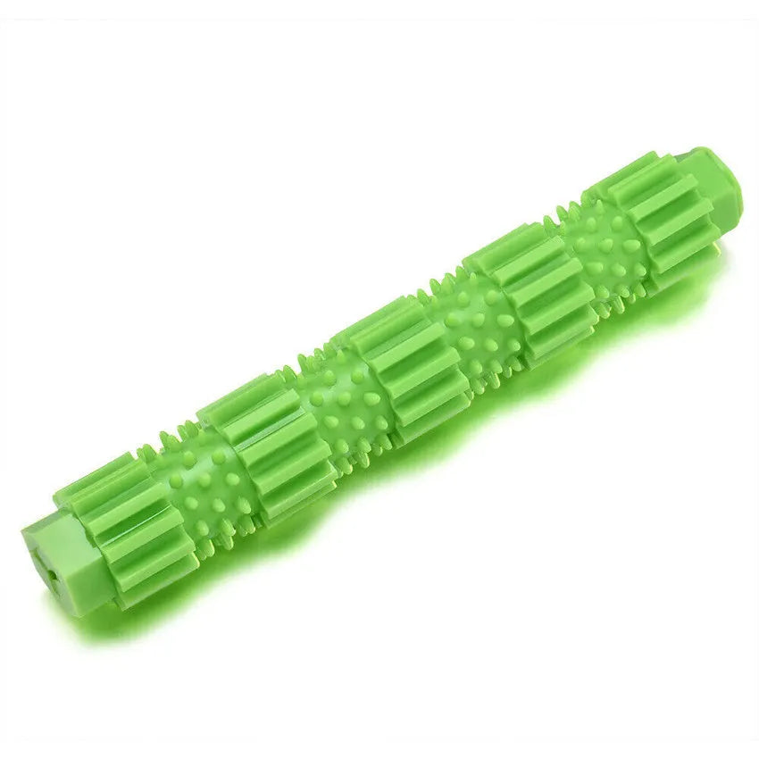 Green and orange durable rubber dog chew toy with treat-dispensing hole for aggressive chewers.