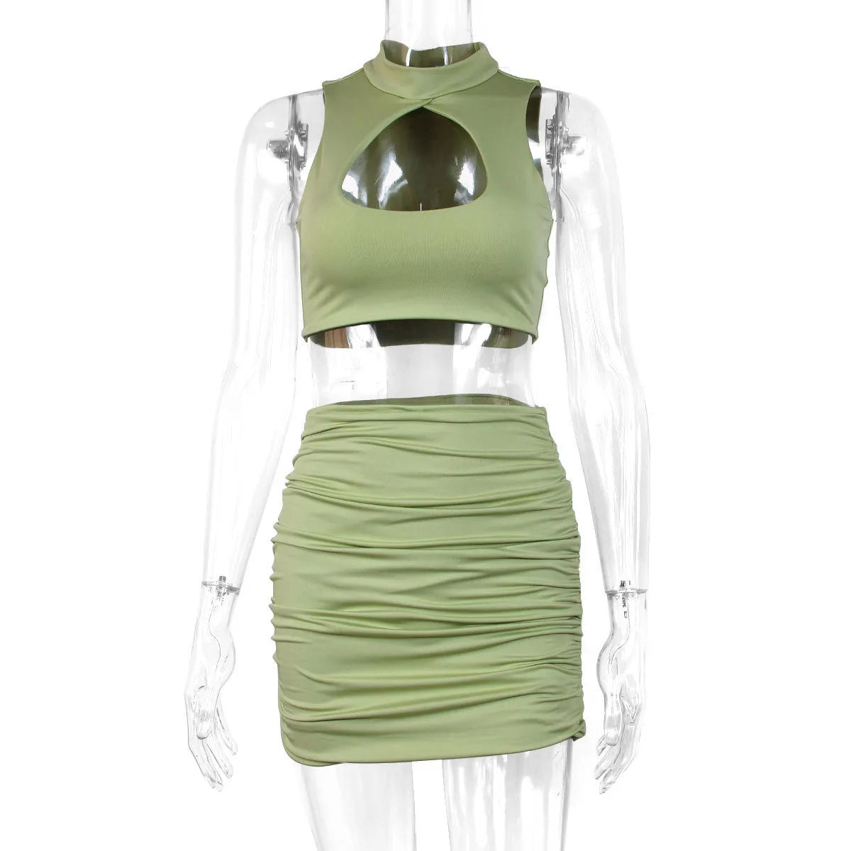 Light purple women's two-piece set with hollow-out vest top and split skirt on a model.