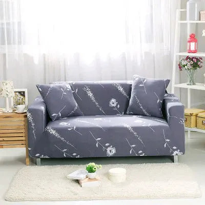 Printed stretch sofa cover with geometric pattern on three-seater sofa