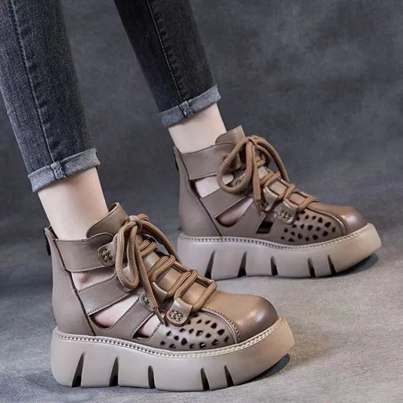 Women's black plush leather platform sandals with fish mouth toe and hollow hole design on a PU sole.