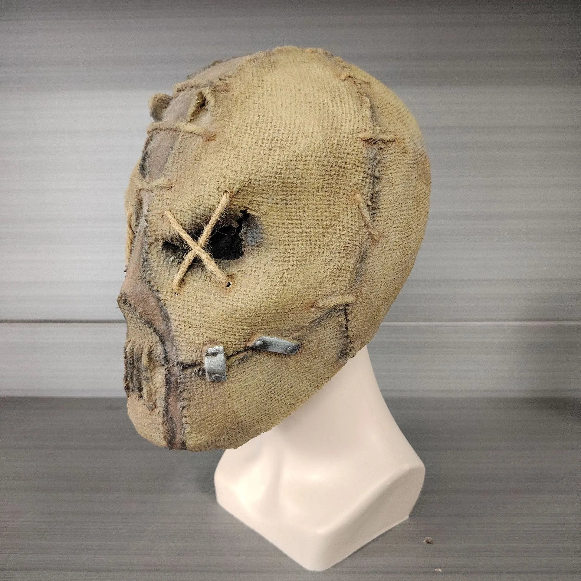 Latex Halloween mask with detailed scar skull design shown from front, suitable for adult wear
