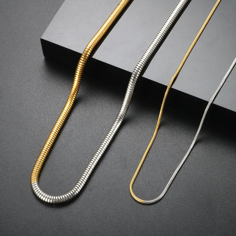 Golden stainless steel snake bone chain necklace with geometric line design