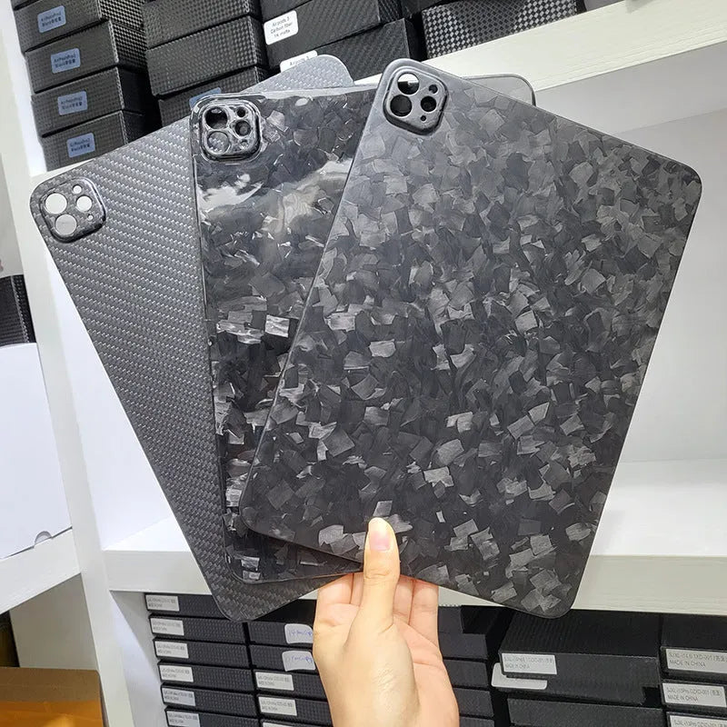 Genuine carbon fibre hard protective case for Apple iPad Pro 11 tablet in matte and forged finishes.