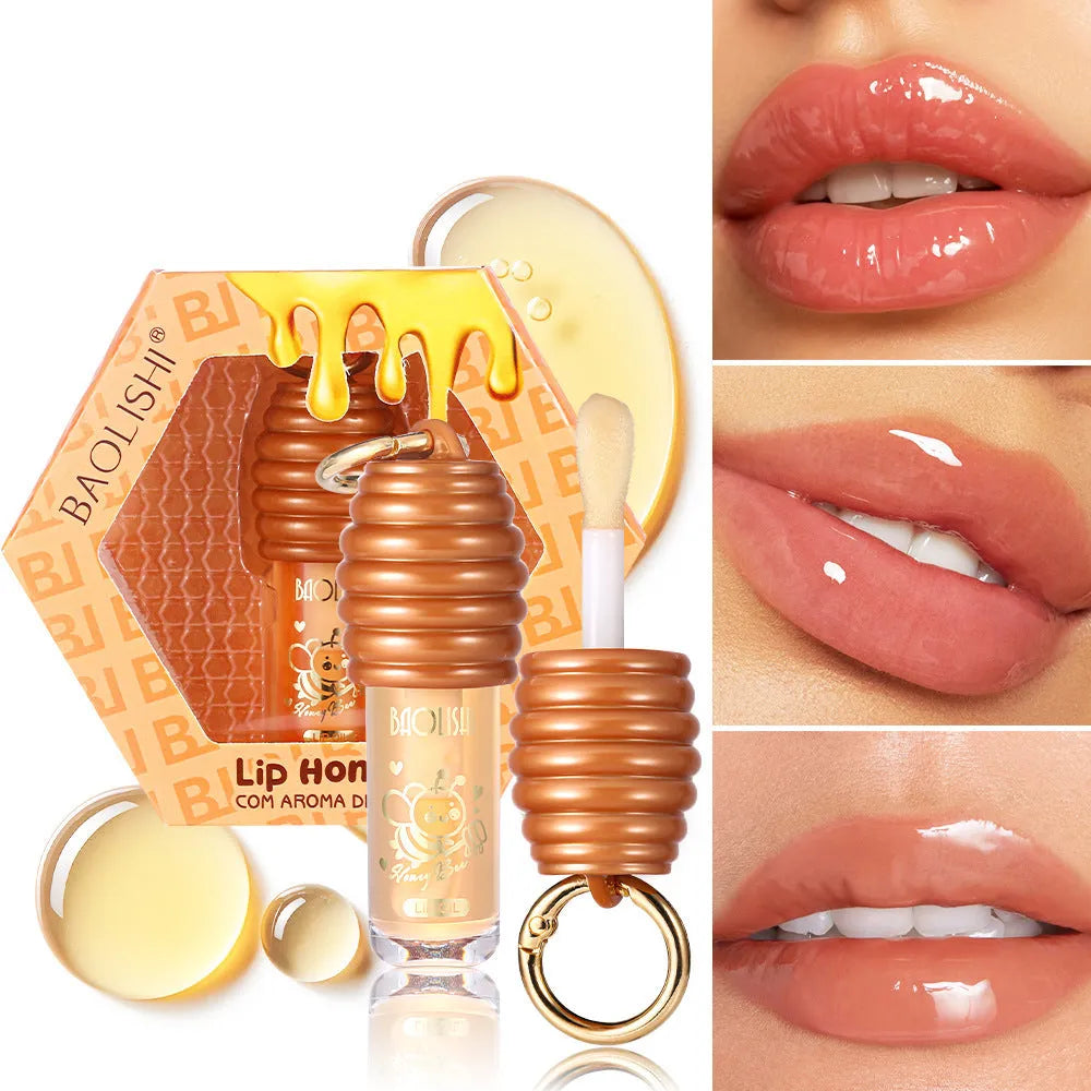 Honey lip gloss in portable keychain pannier bag packaging for on-the-go moisturising