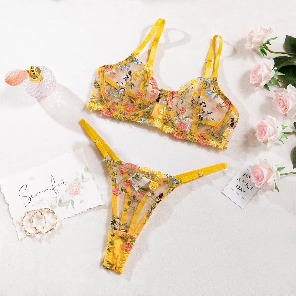 Floral bra set with steel ring T-back in polyester mesh fabric showing 3/4 moulded cup design