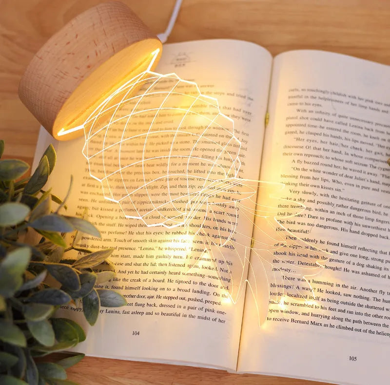 Cartoon pineapple-shaped USB night light with wood and acrylic casing on a table.