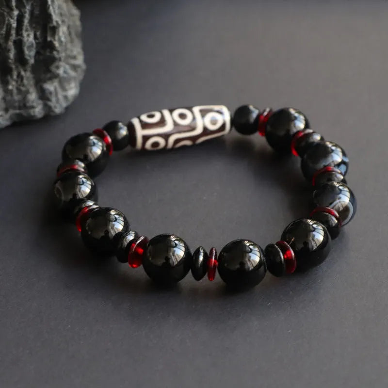 Black agate Dzi bead bracelet with 11mm geometry-shaped stones and hand-woven construction