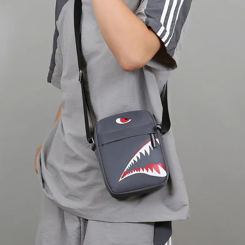Men's small Oxford cloth crossbody bag with animal print pattern and adjustable shoulder strap