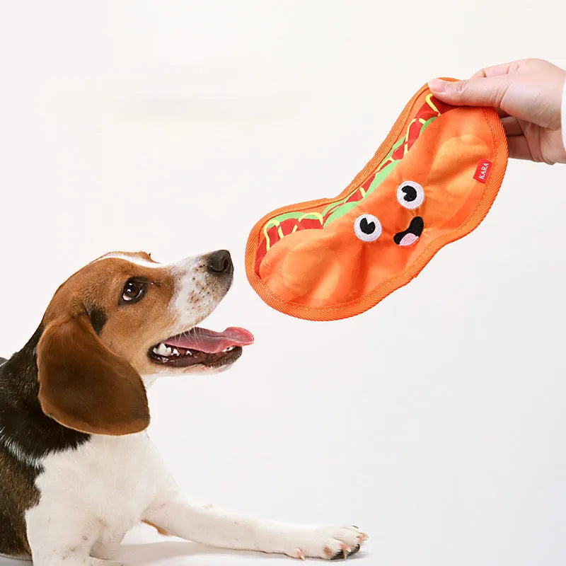 Food-shaped dog chew toys including hamburger, fries, hot dog and pizza designs with crinkle and squeak features
