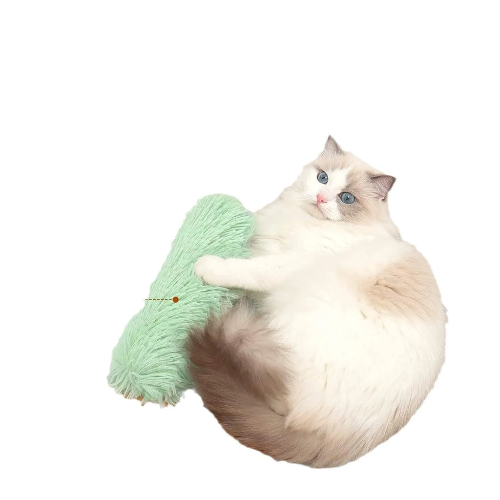 Soft plush cat toy pillow in blue, green, pink, or white, measuring 27cm by 10cm.