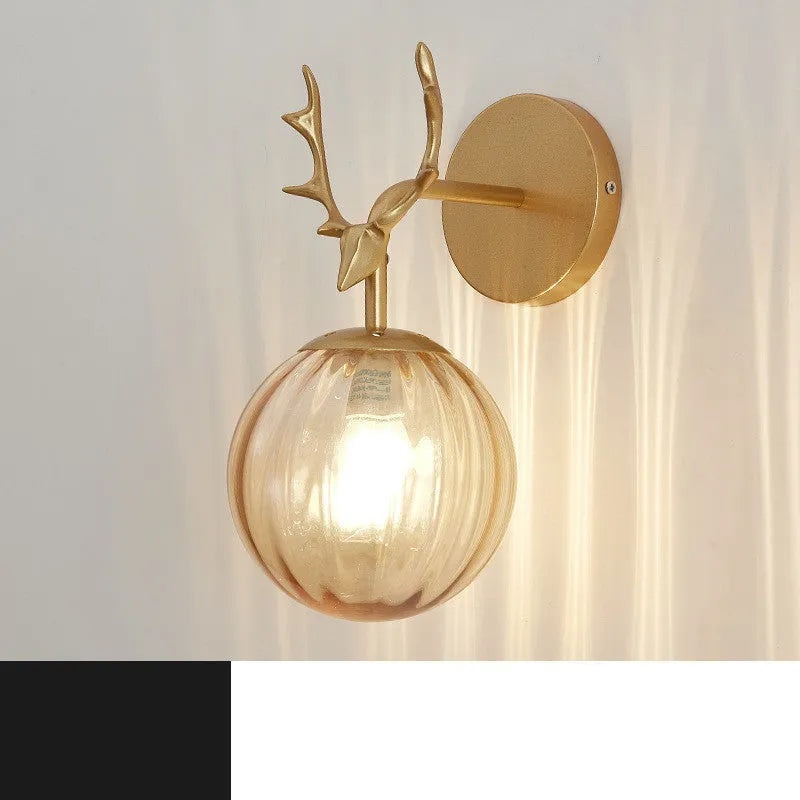 Modern round glass wall lamp with Nordic minimalist design on a wall.