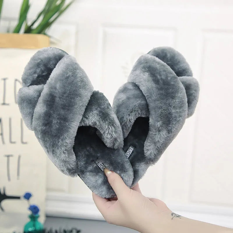 Cross strap open-toe fur slippers in multiple colours on a non-slip rubber sole.