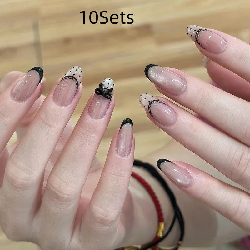 Five sets of sweet girl style press-on fake nails in a random colour assortment